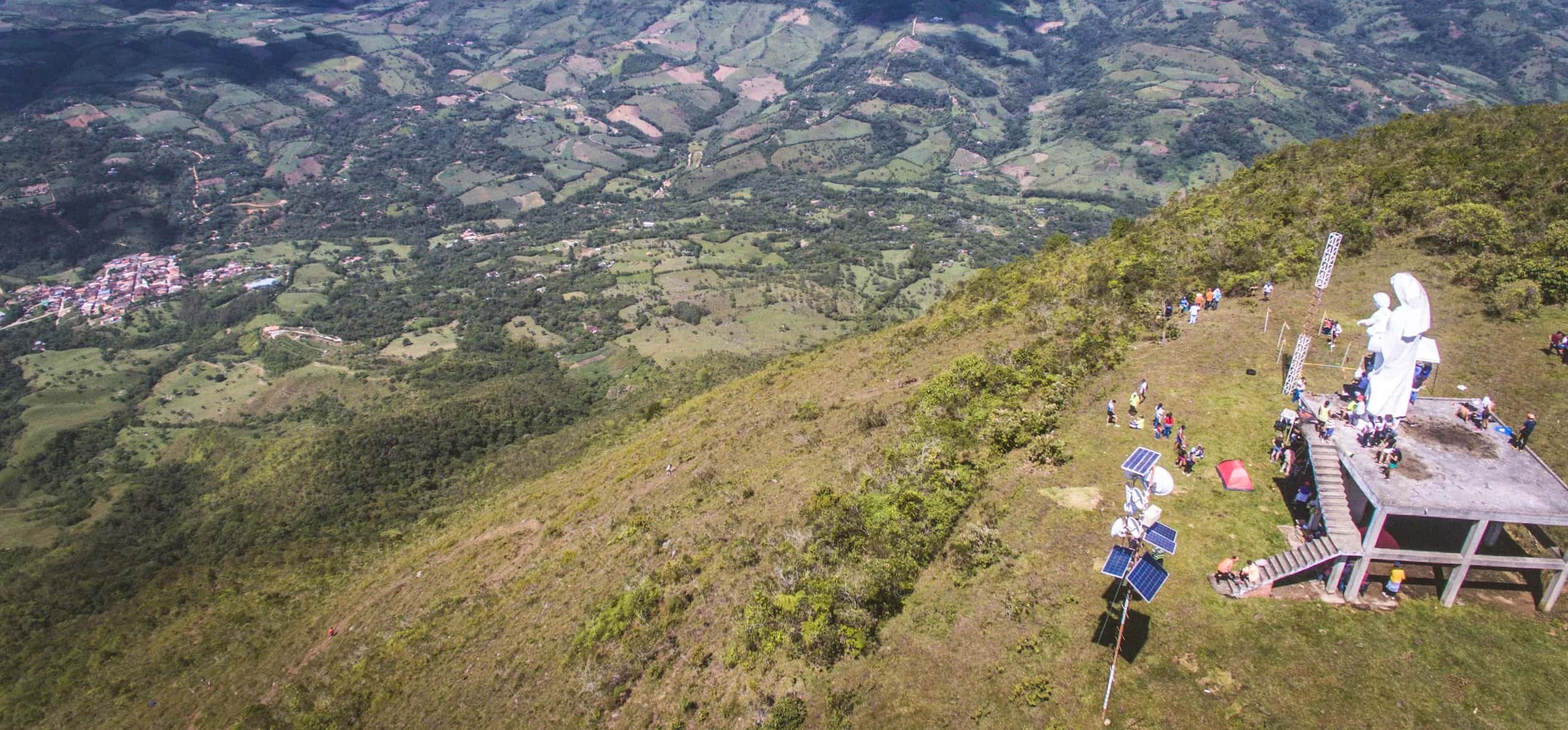 Aerial view of the summit of Cerro La Jabonera, with the Virgen del Carmen monument and the town of Ocamonte in the valley