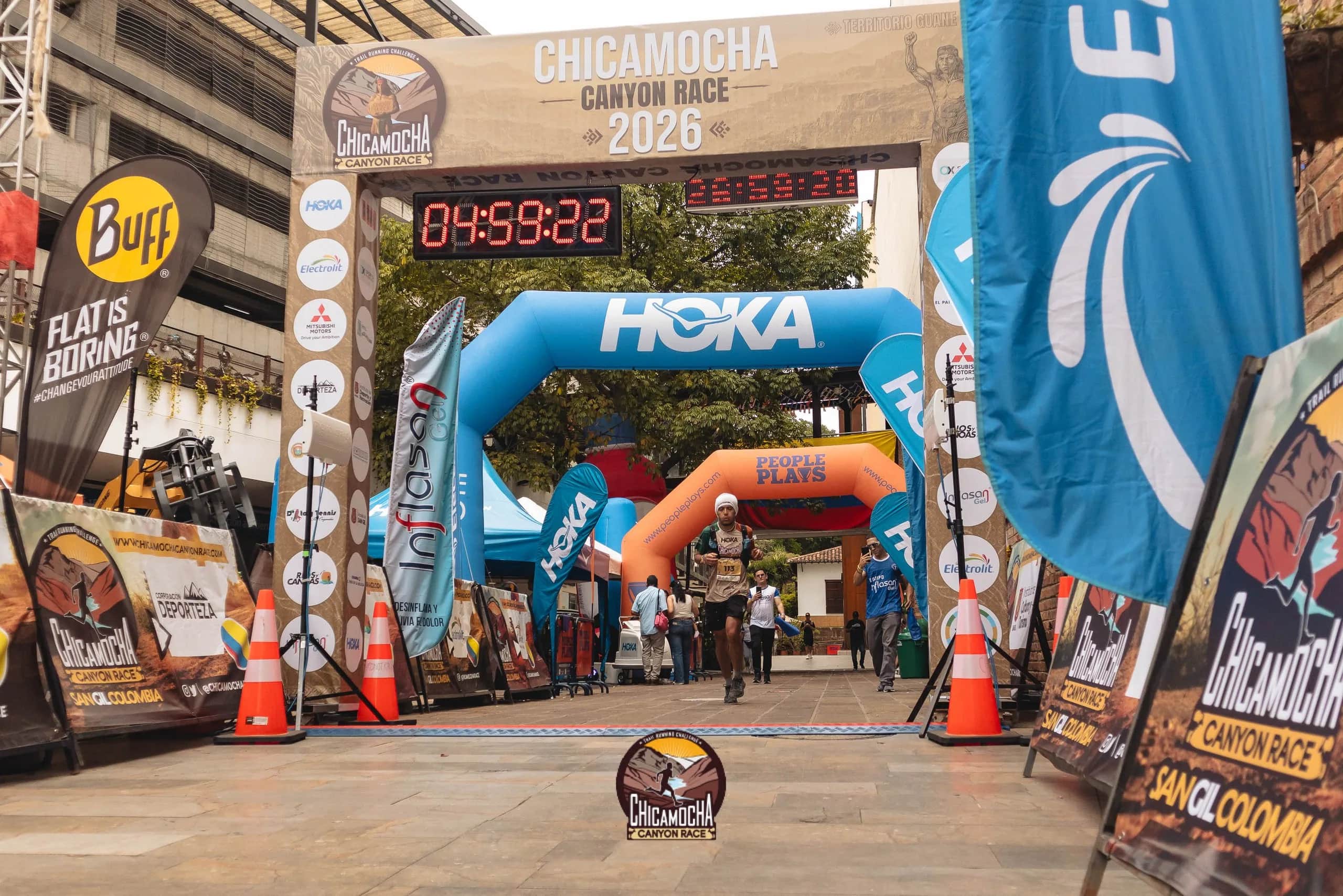 2026 finish area with the gantry, the clock and the sponsor arches