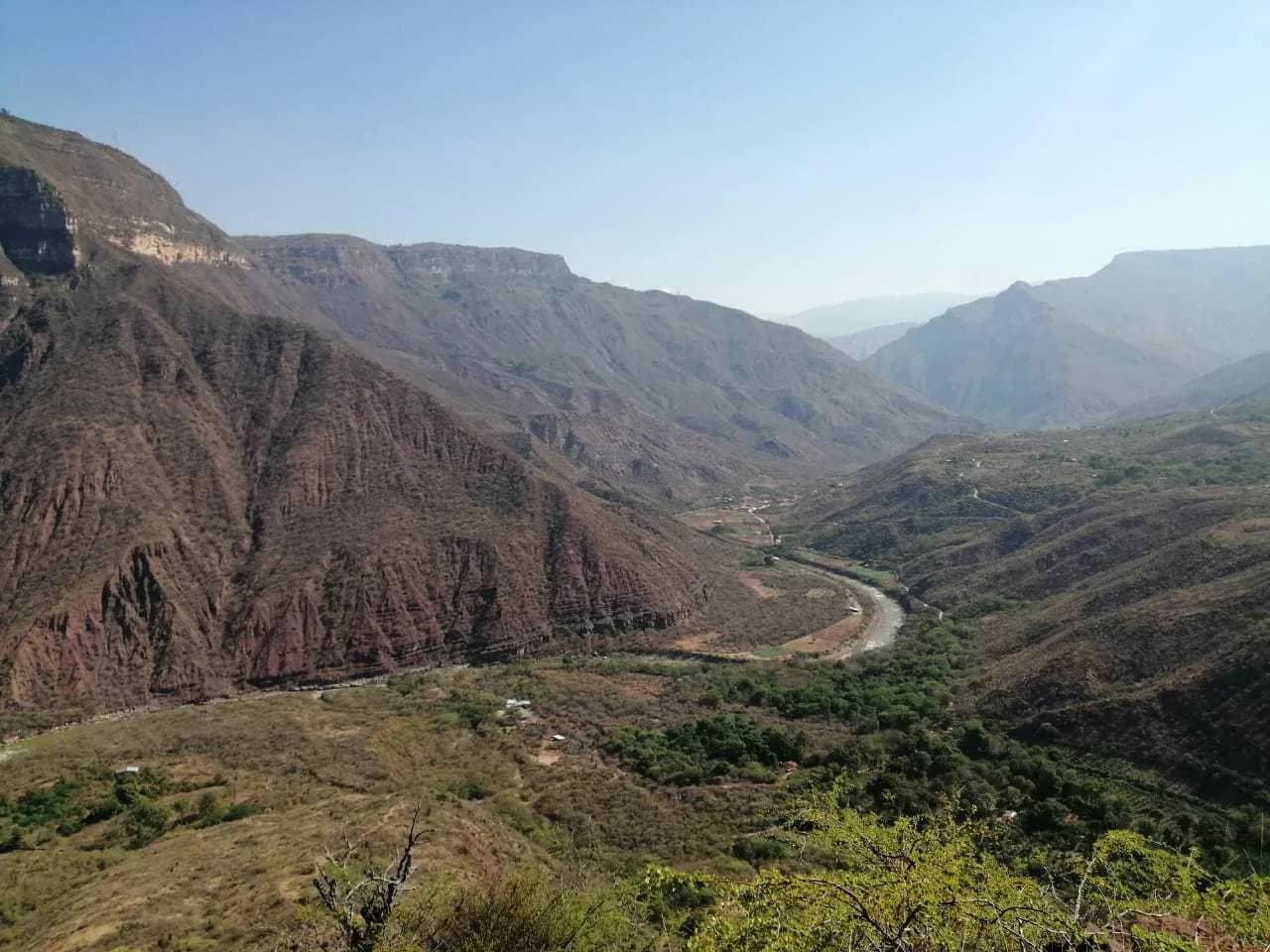 View of the Chicamocha Canyon with the river winding along the valley floor