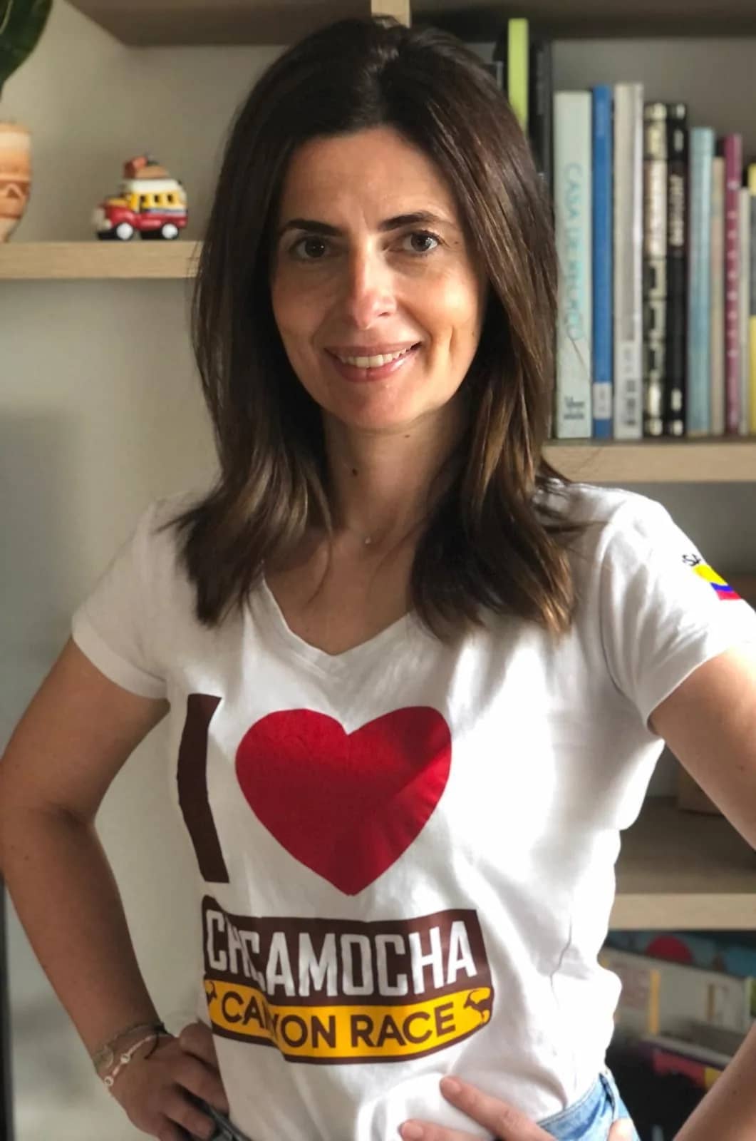 Laurence Defabri smiling in an I love Chicamocha Canyon Race T-shirt