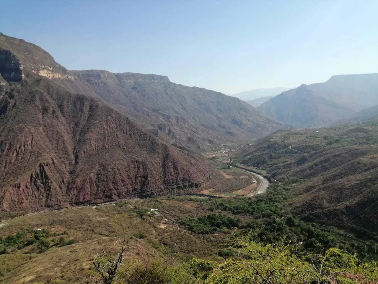 View of the Chicamocha Canyon with the river winding along the valley floor